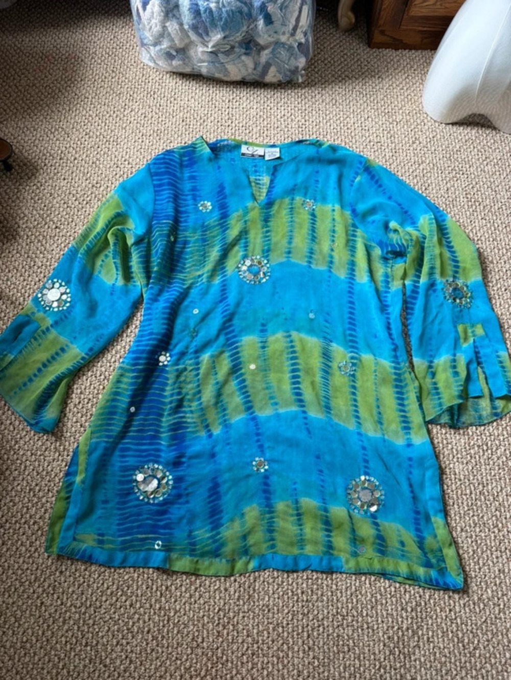 Blue and green tie-dye cover-up with rhinestone embellishments